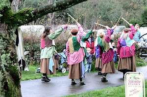 Dancers cross sticks