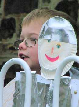 Lad with paper plate face