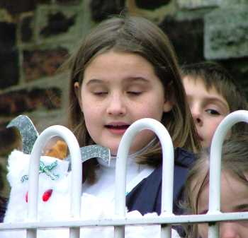 Girl with boy over shoulder