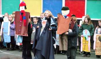 Puppets before coloured panels