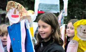 Smiling girl with puppet